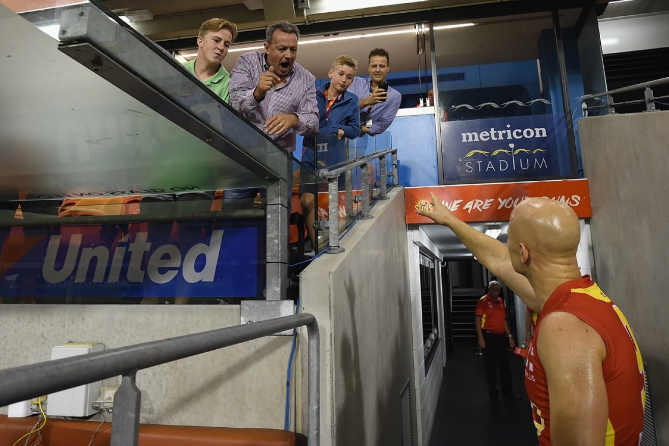 Gary Ablett in a heated exchange with fans on the Gold Coast last year.