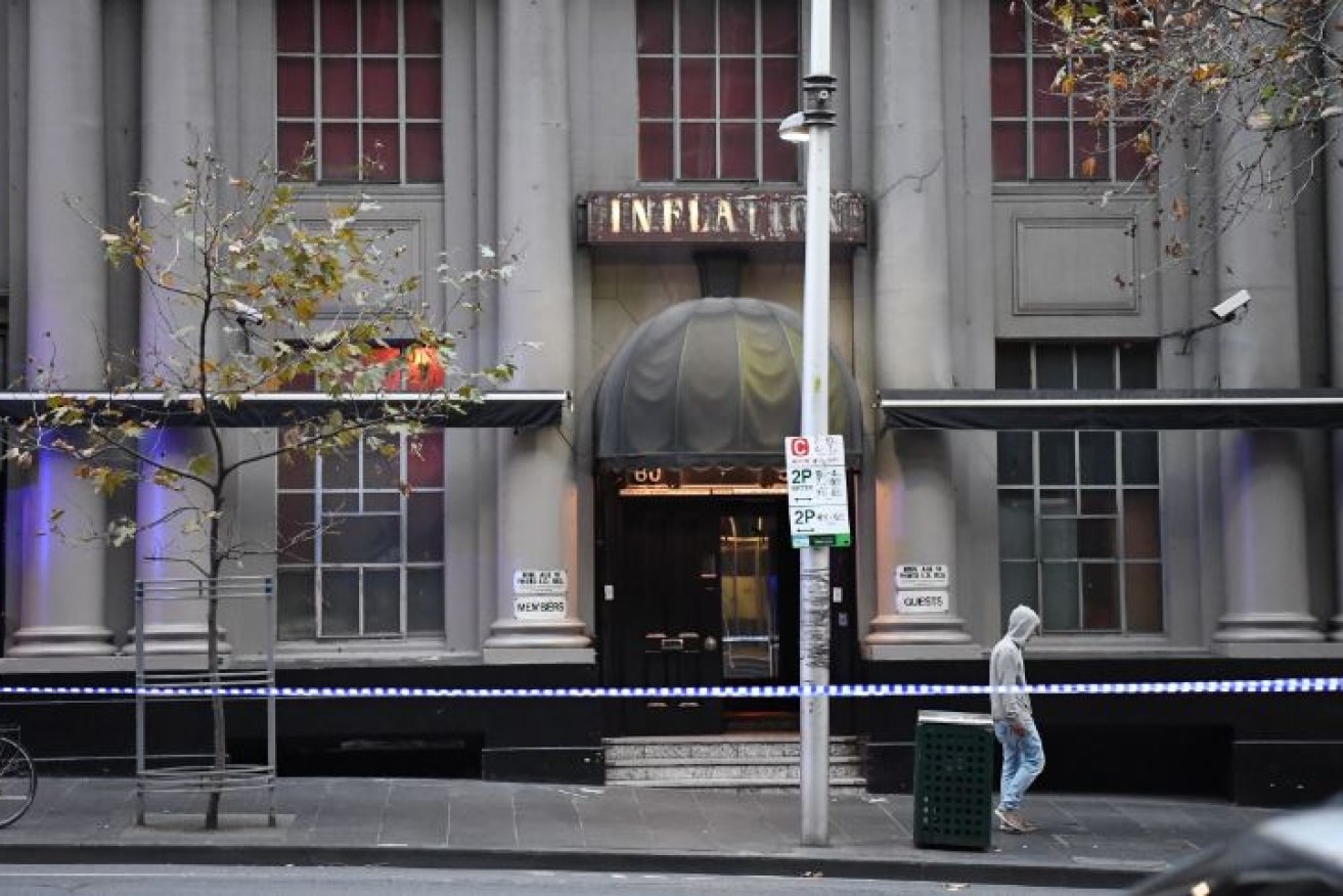 Crime-scene tape seals off the Inflation nightclub in Melbourne, where police shot a partygoer and wounded a woman.