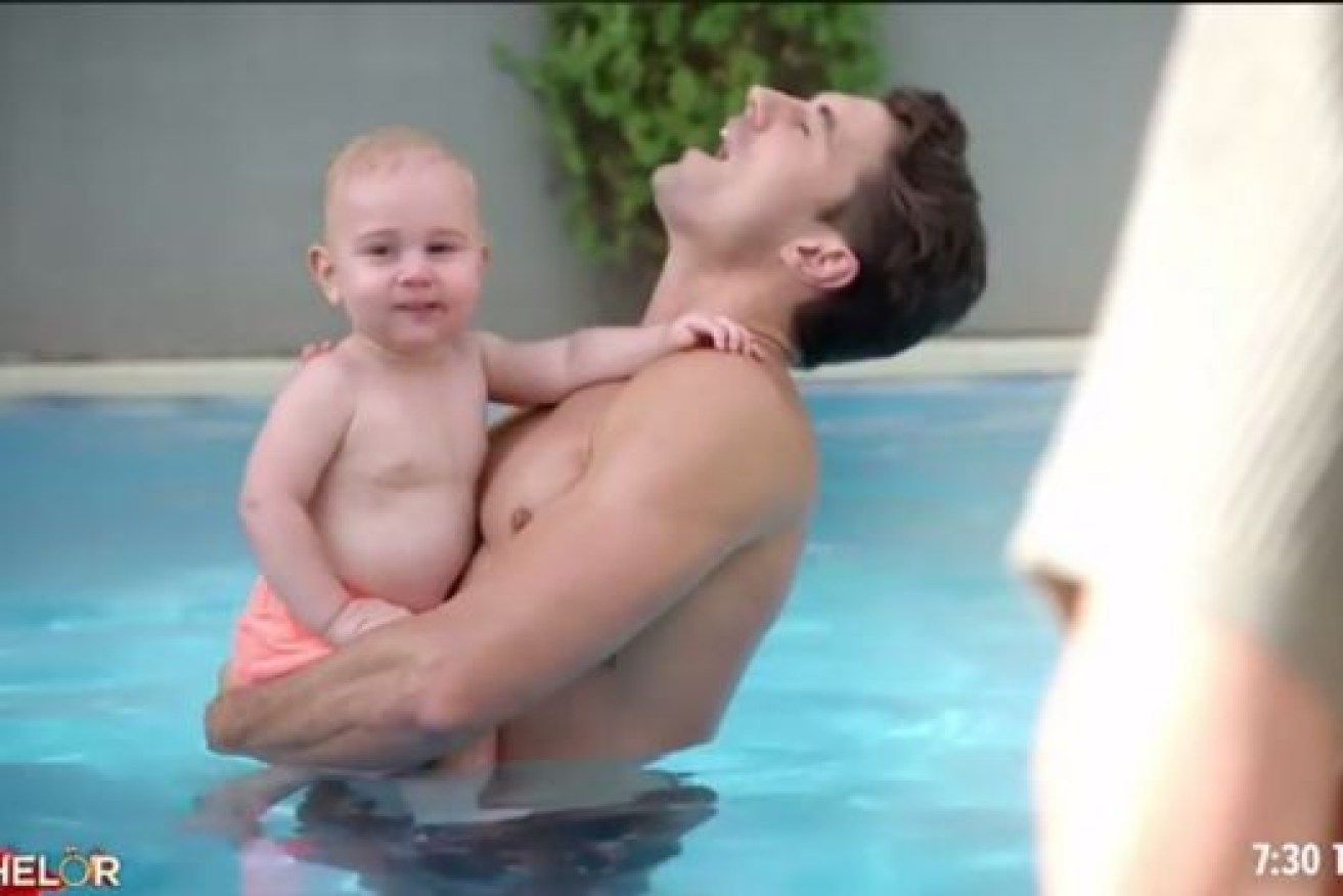 Half-naked man and a baby: what more could a girl want?