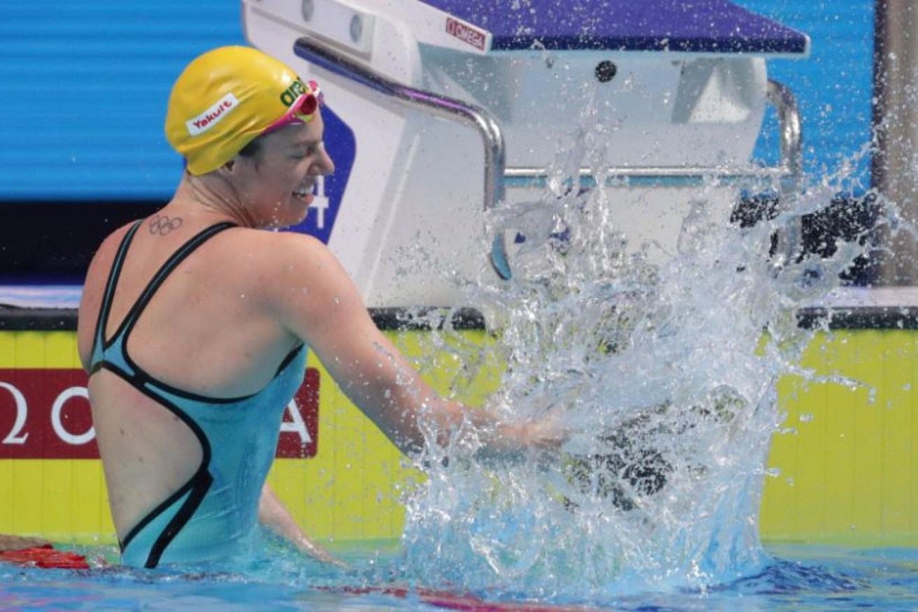 Emily Seebohm makes a big splash after claiming Australia's first gold medal and setting a national record for the 200 metres backstroke.