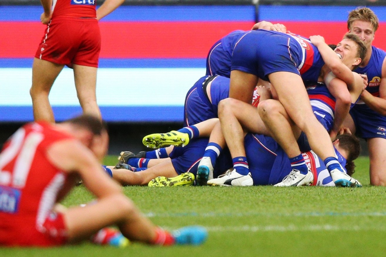 Despair and elation on display for all to see after the 2016 AFL Grand Final.