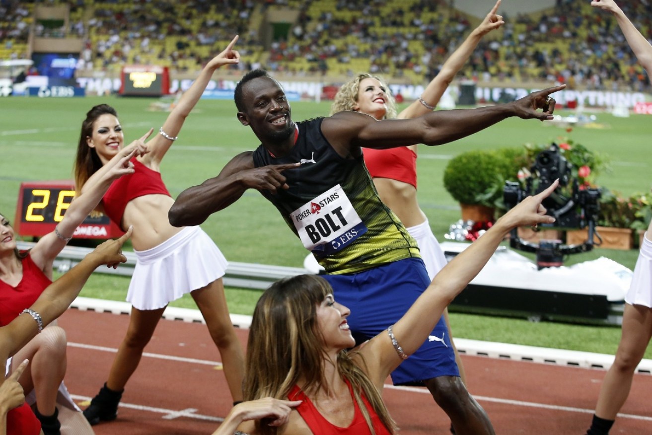 Jamaican Usain Bolt warms up for his sub-10 sprint in Monaco. Photo: AAP