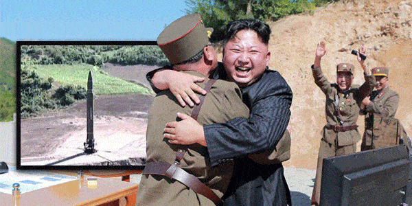 Celebrating the launch of an earlier missile, Kim Jong Un embraces a favourite general.  