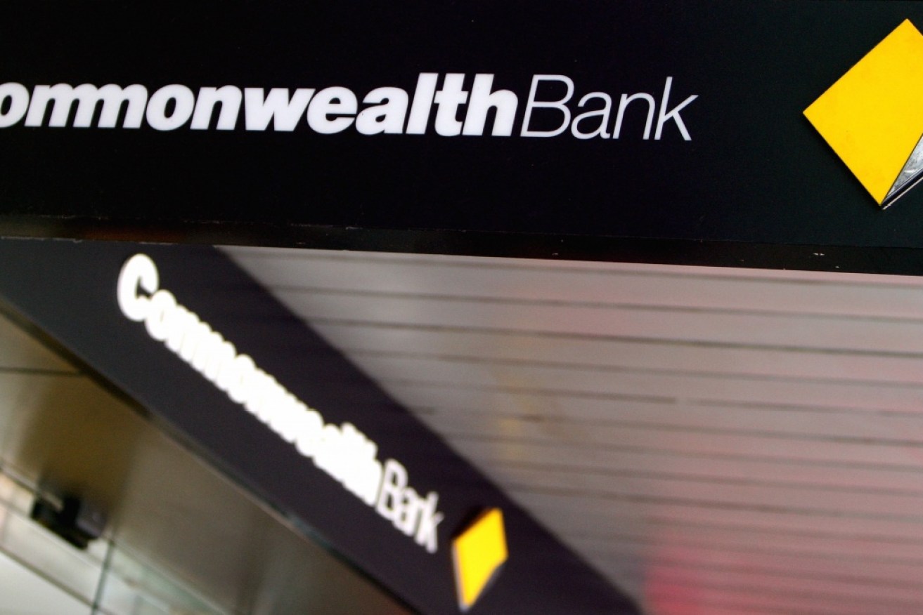 The Commonwealth Bank half year profit has factored in penalties expected from the money-laundering scandal.