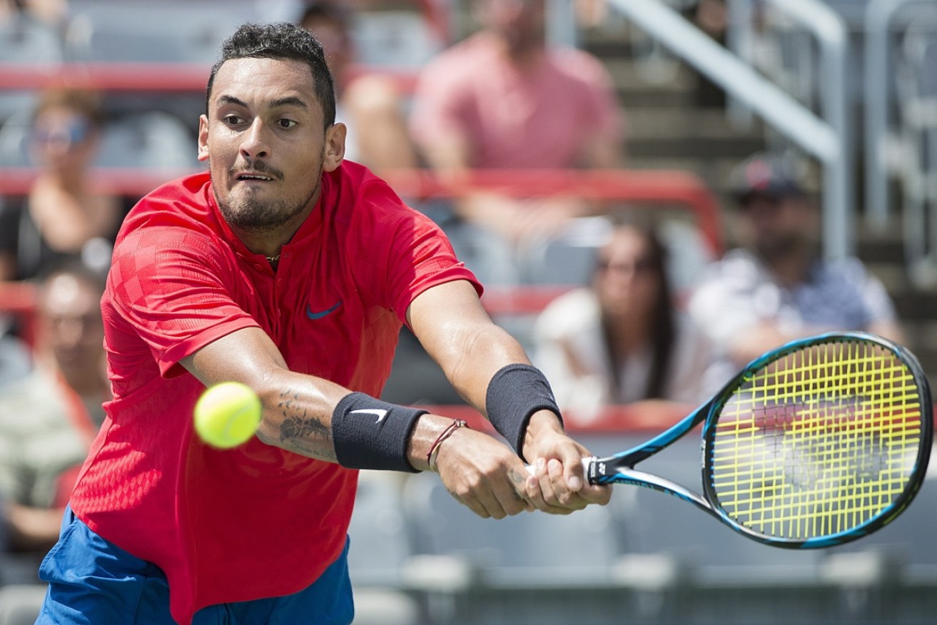 Nick Kyrgios dismisses of Serbia's Viktor Troicki in the first round at the Rogers Cup.