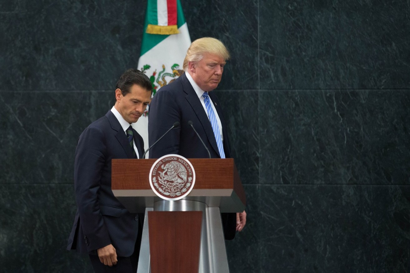 Leaked transcripts show Donald Trump tried to pressure Mexico's President Enrique Pena Nieto over the border wall.