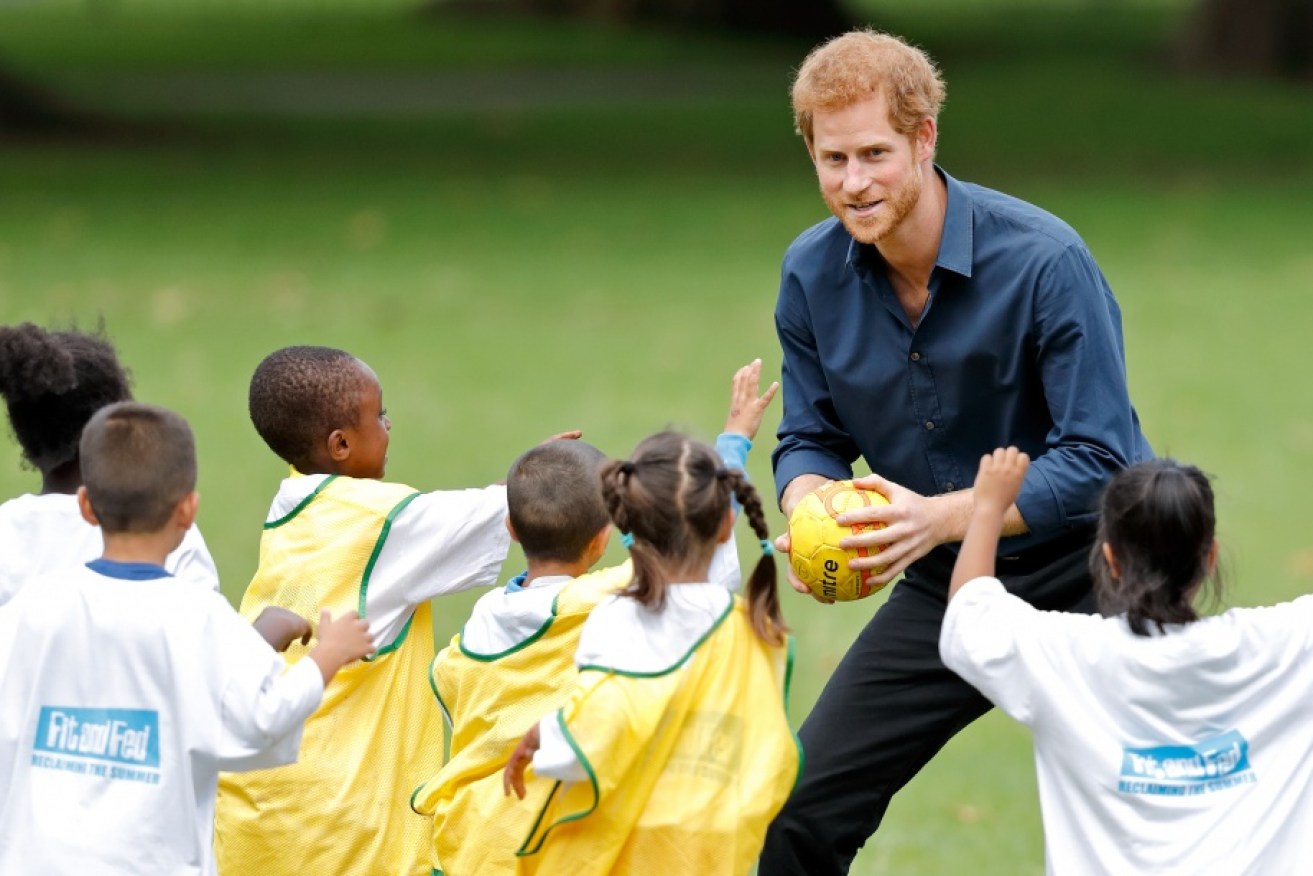 Prince Harry doing charity work in London.