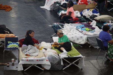 'Get out now!!' Houston's record flood worsens