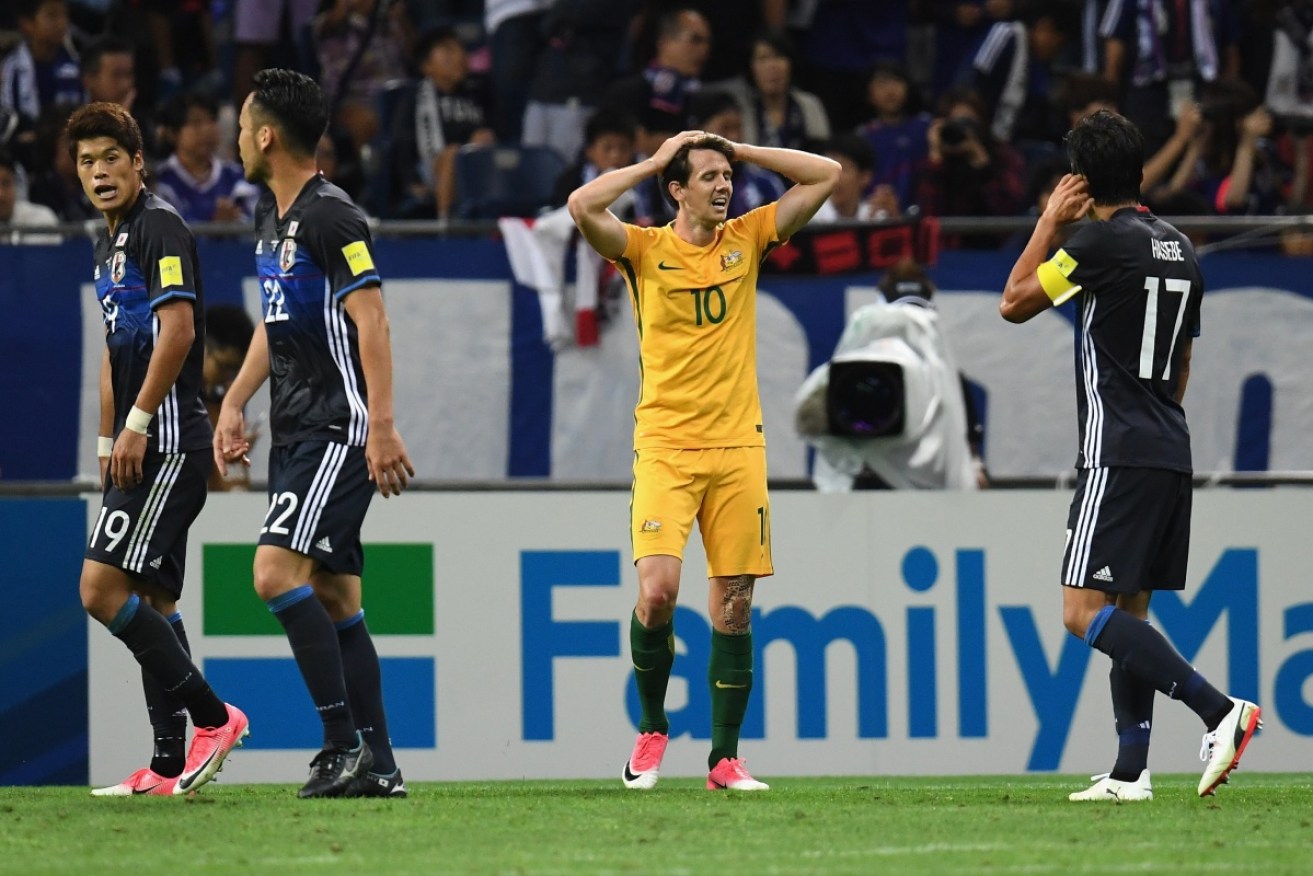 Robbie Kruse of Australia shows his disappointment during the World Cup qualifier against Japan.