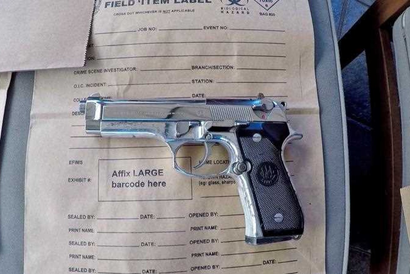 A loaded 9mm semi-automatic Beretta handgun seized from the home of Wahiba Ibrahim.