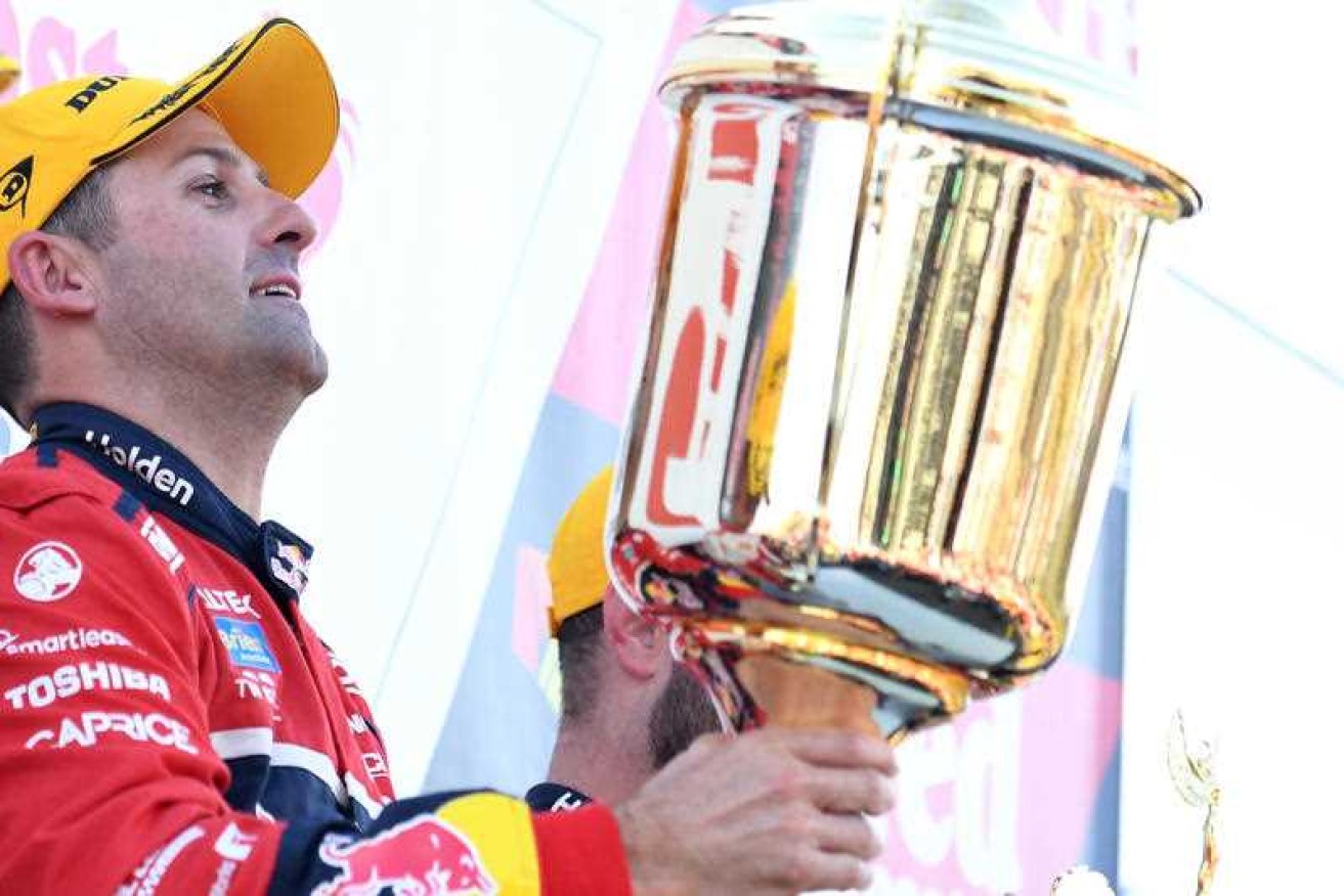 Jamie Whincup celebrates his win in Sydney, pushing him to the top of the all-time Supercars race wins list.