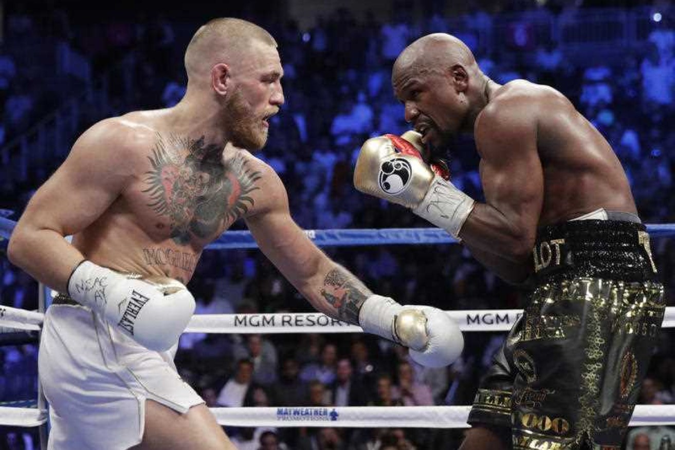 Floyd Mayweather gradually got on top of Conor McGregor as the fight went on. Photo: AP