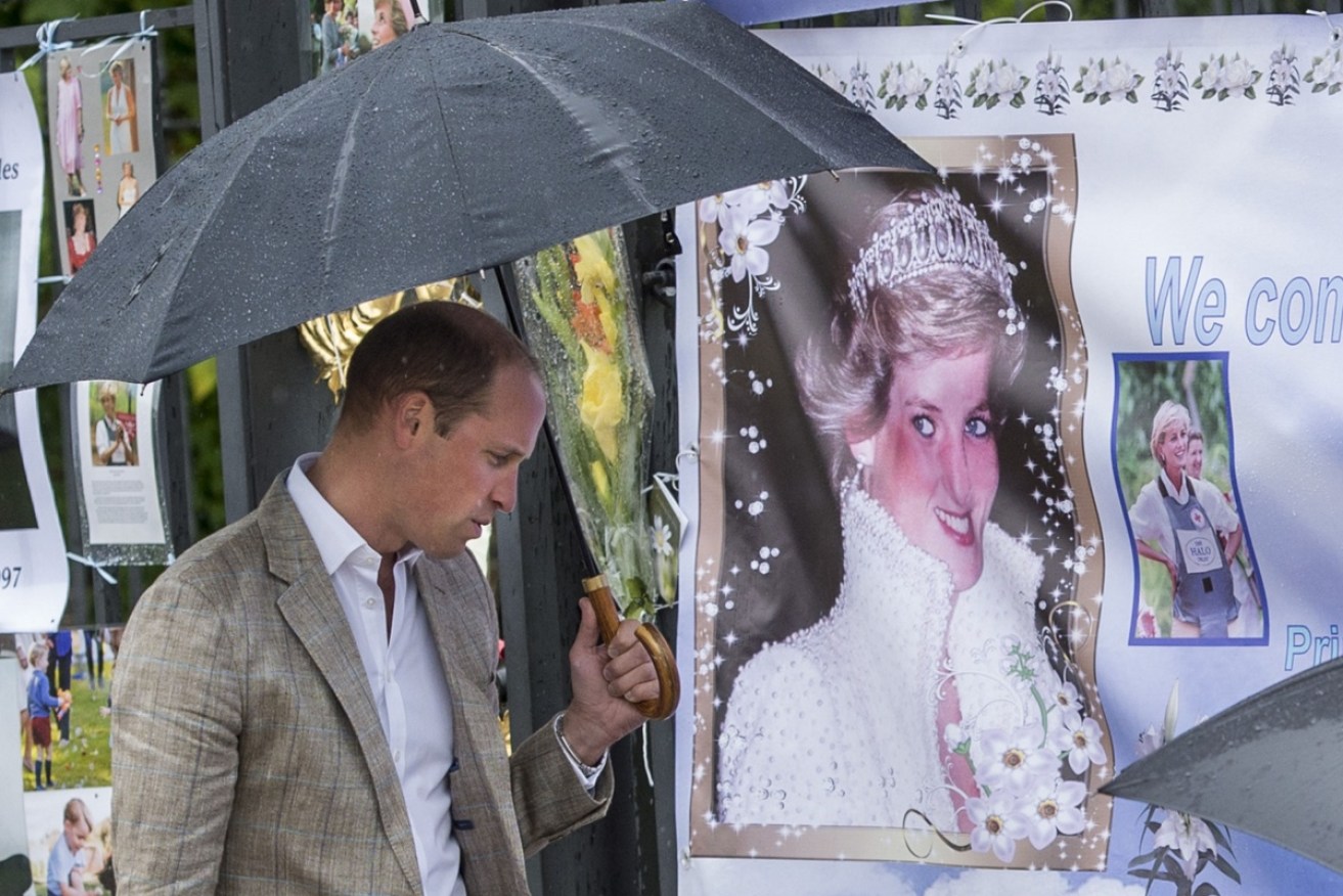 Princes William and Harry have made a point of viewing the floral tributes left at Kensington Palace's gates on the 20th anniversary of their mother death.