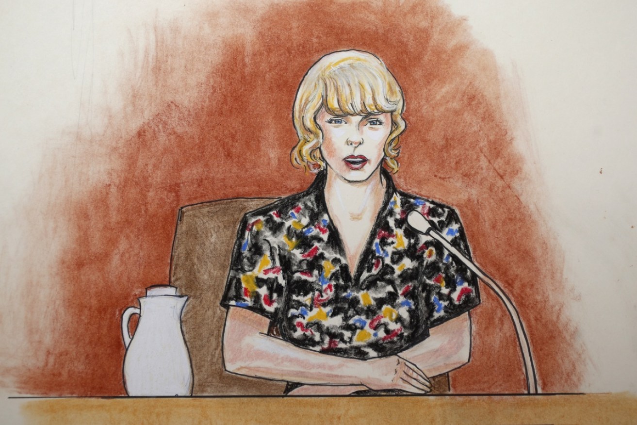 A courtroom sketch of singer Taylor Swift in the witness stand during a trial in Denver. 
