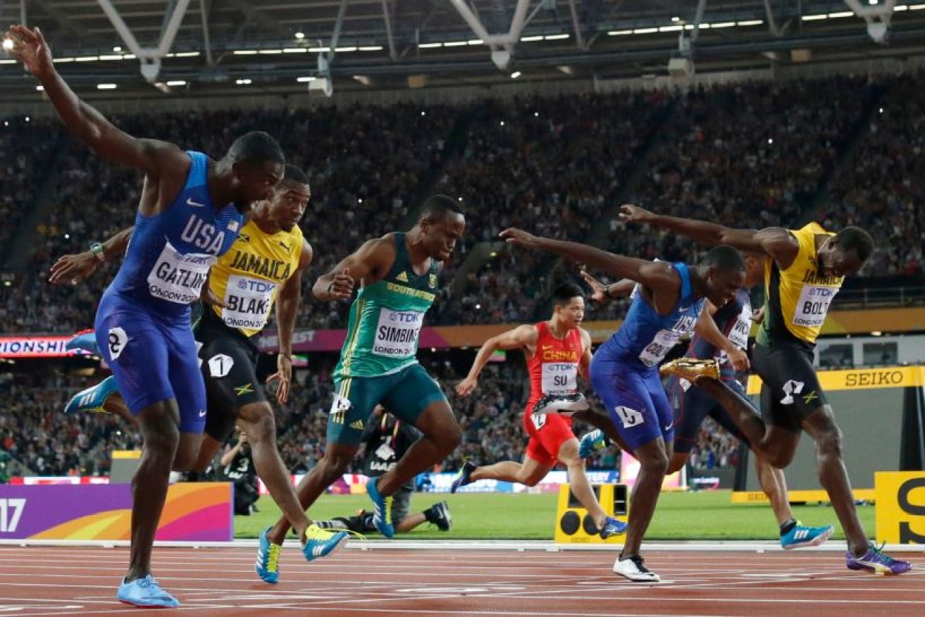 Usain Bolt  (in yellow) ends his career on an unfamiliar note, running third behind Americans Justin Gatlin and Christian Coleman.