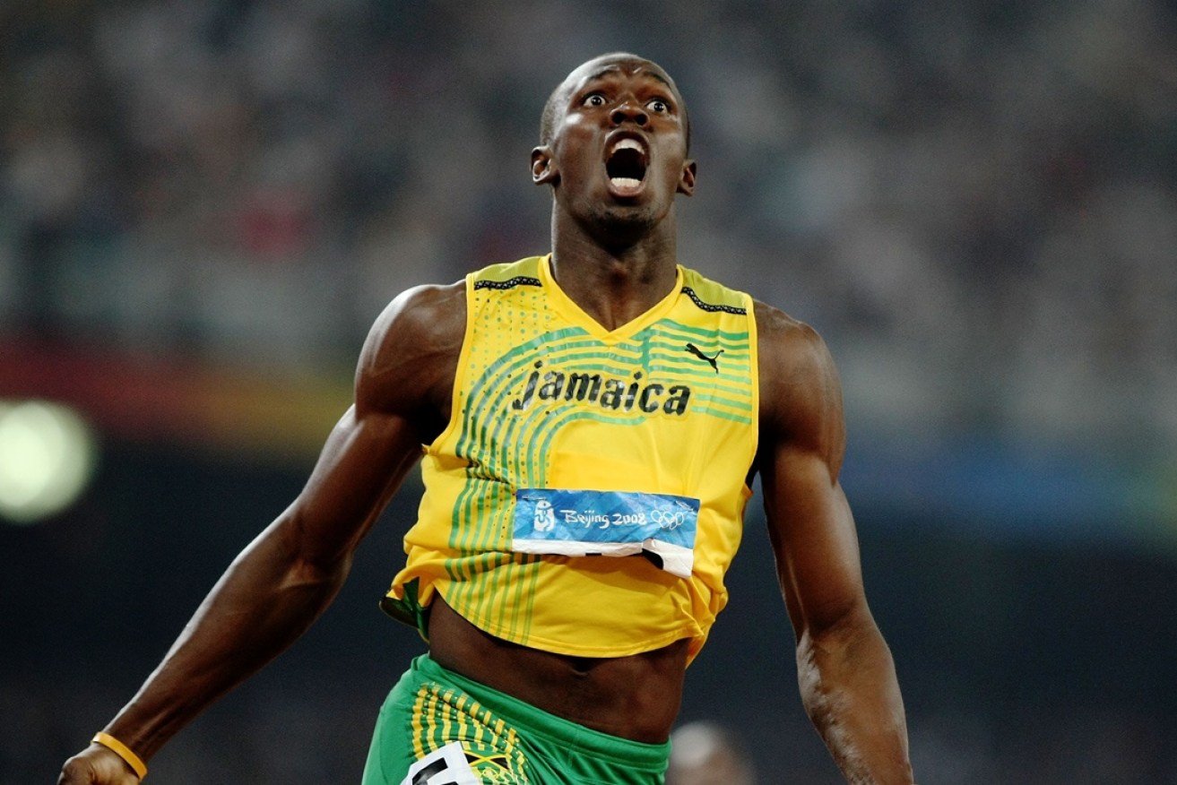 Bolt celebrates a success at the 2008 Olympic Games.