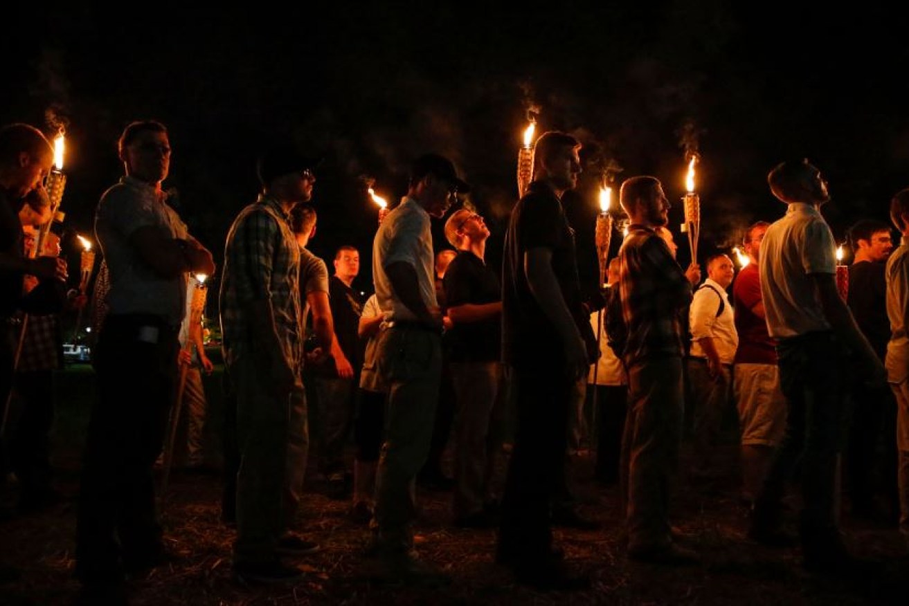 In scenes reminiscent of Nazi germany, white supremacists march with flaming torches through Charlottesville.