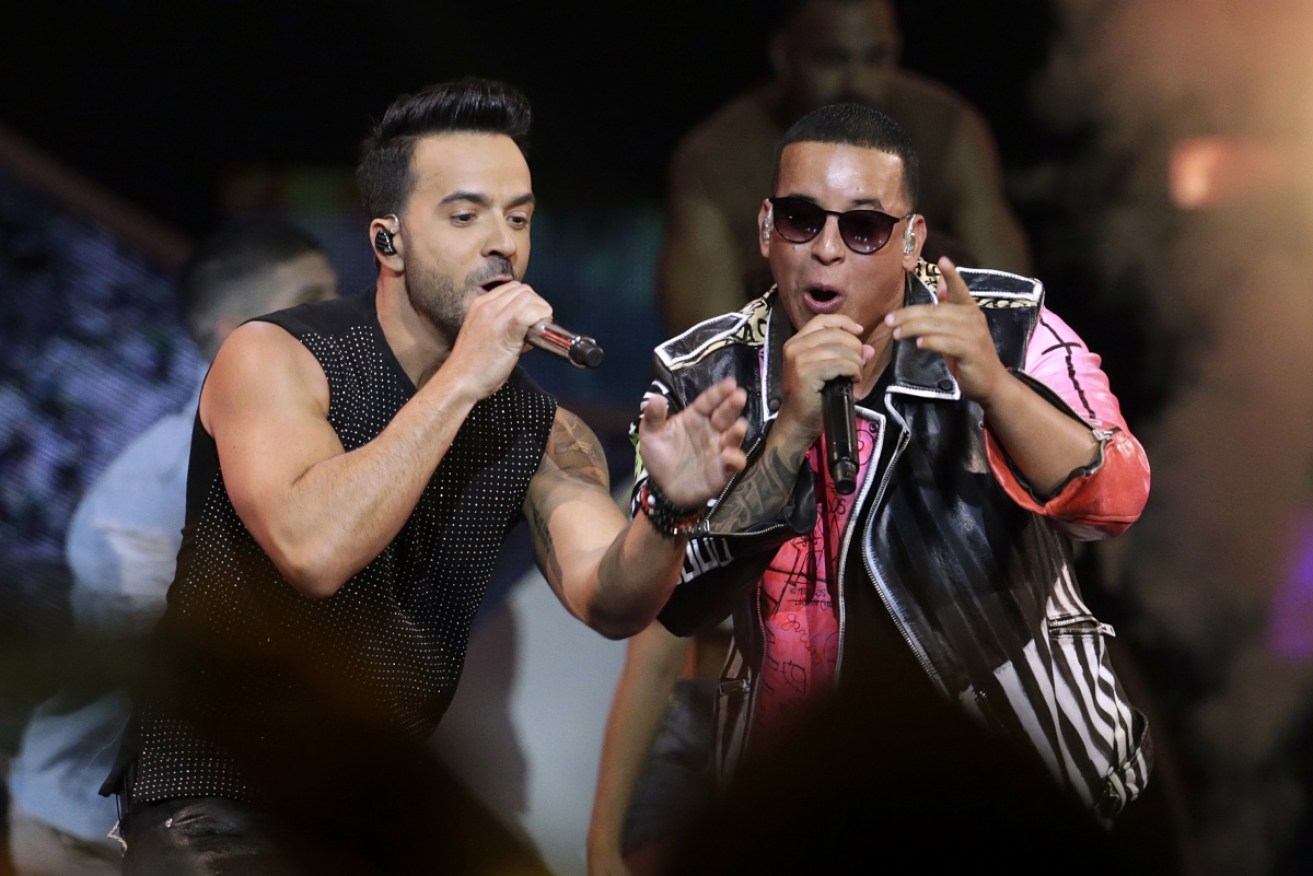 Luis Fonsi and Daddy Yankee's remix of the song with Justin Bieber remains number one in the UK for an 11th week. Photo: AAP