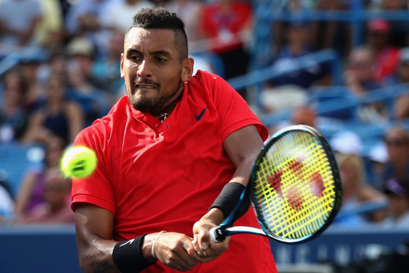 Nick Kyrgios, pictured in a previous match, was too strong for Mischa Zverev in China, advancing to the last eight.