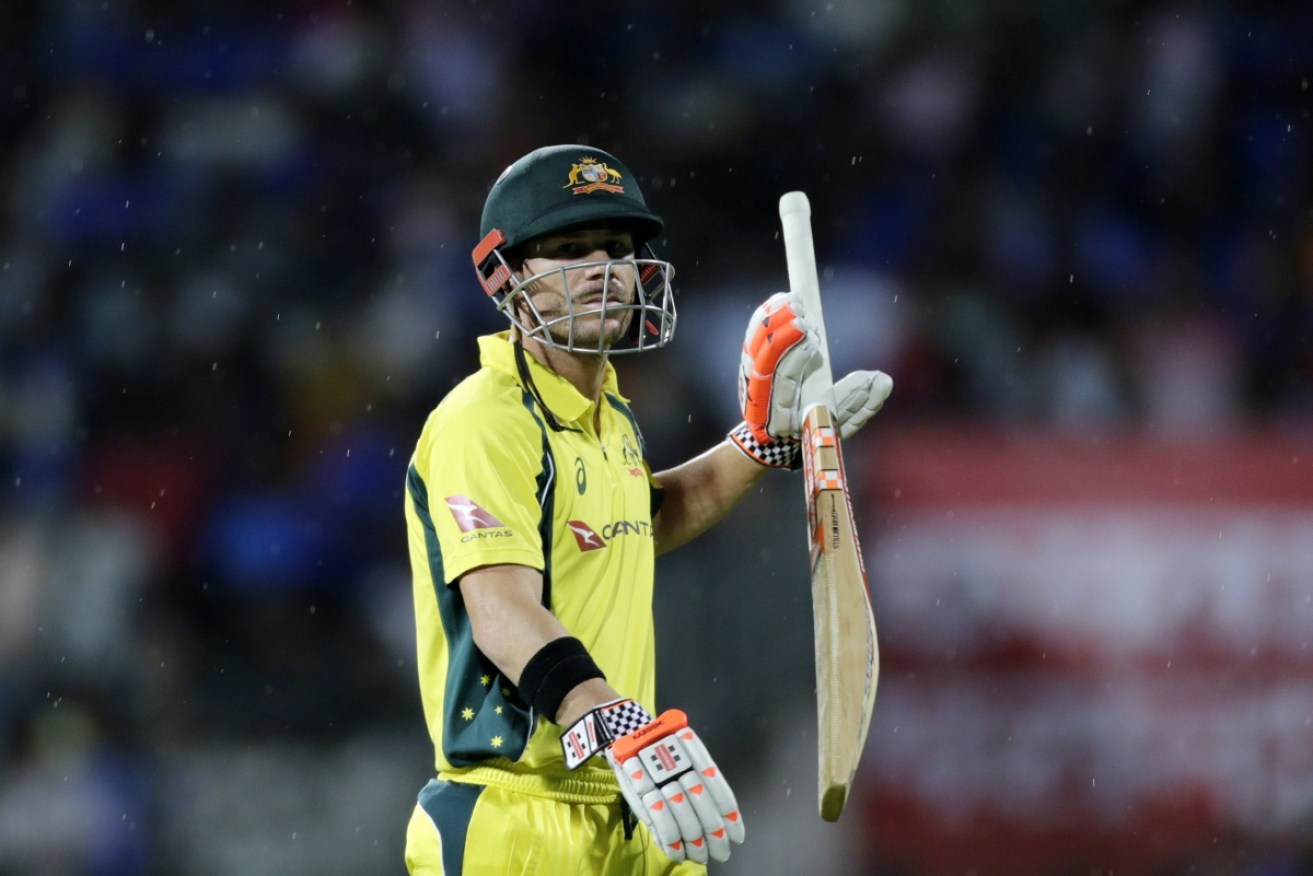 David Warner made just 25 as Australia lost its rain-shortened ODI opener to India.