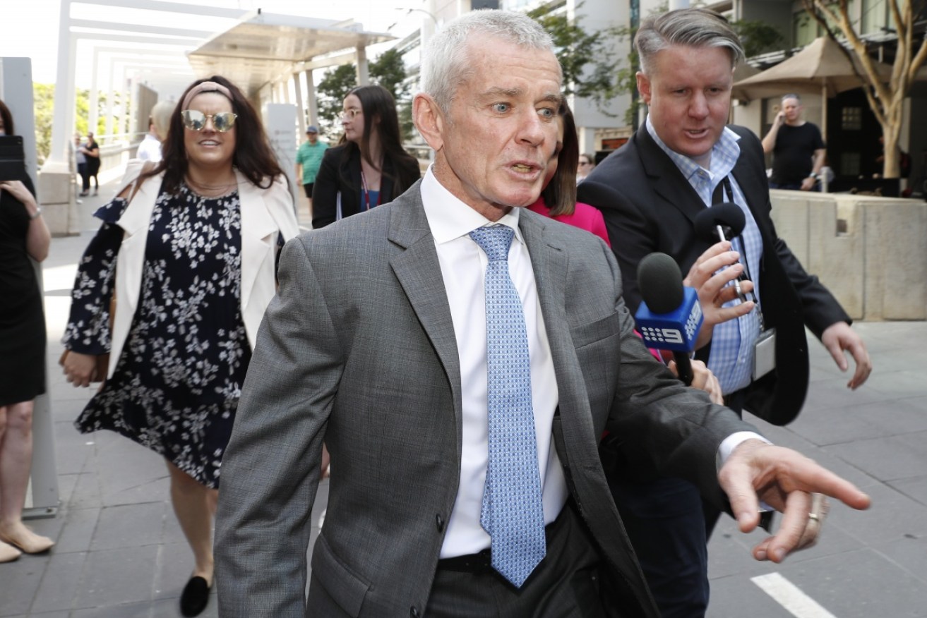 One Nation Senator Malcolm Roberts exits the High Court after being questioned by government lawyers over his UK citizenship.