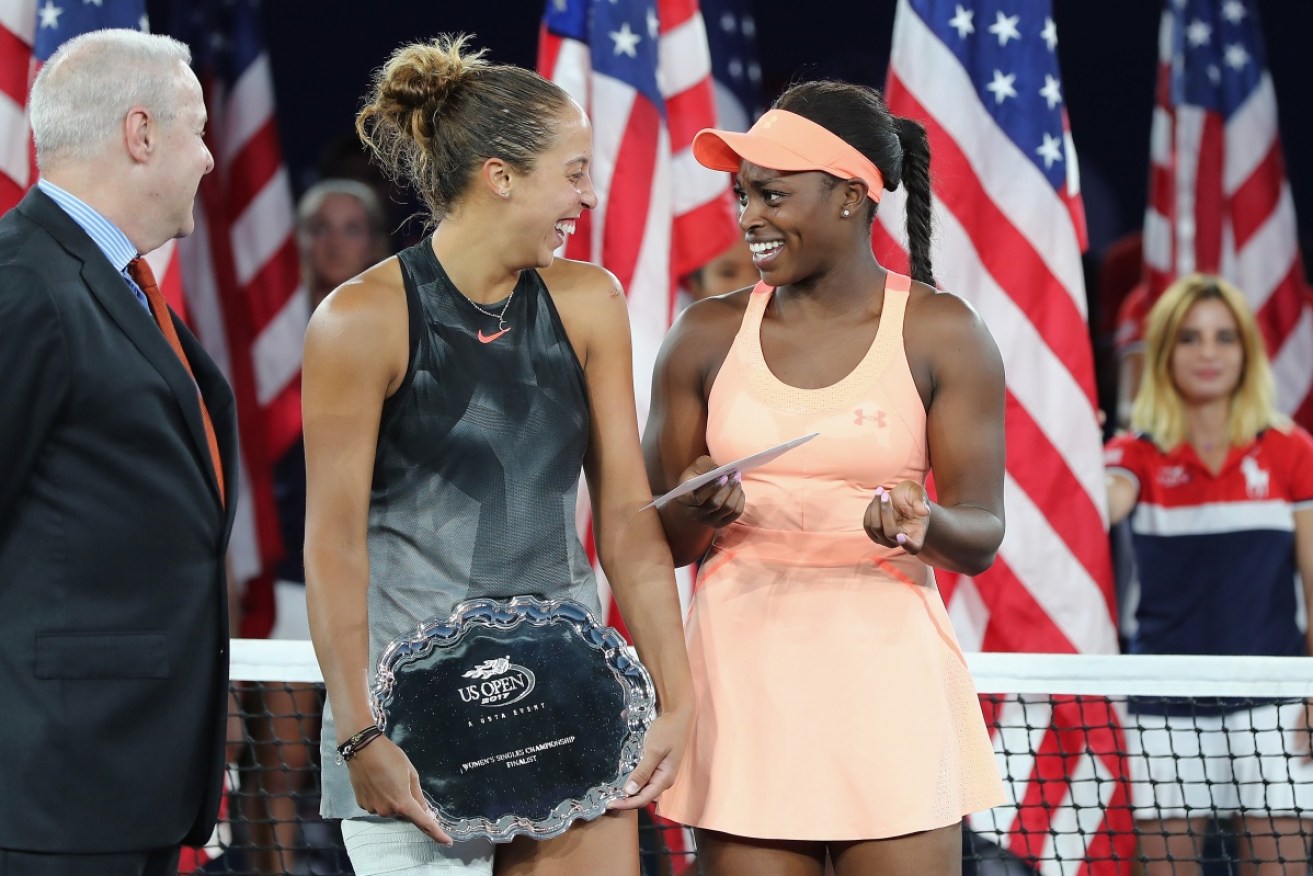 Look at the size of this cheque: Sloane Stephens talks to Madison Keys in the aftermath of their US Open final. 