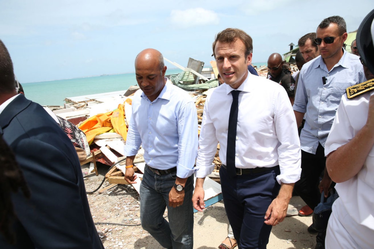 Emmanuel Macron (right), with Saint Martin President Daniel Gibbs (left) during his visit after Hurricane Irma.
