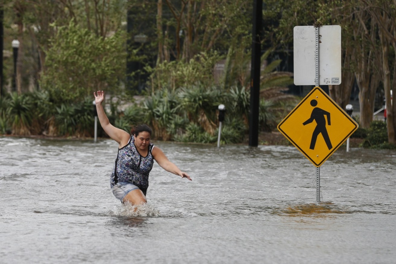 As the winds drop, the floodwaters continue to rise through the southern US.
