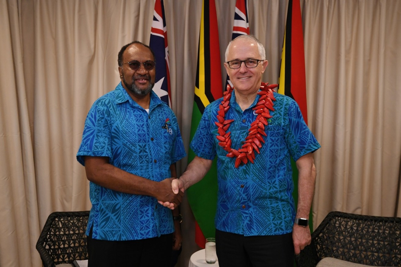 Australian Prime Minister Malcolm Turnbull (right) shakes hands with Prime Minister of Vanuatu Charlot Salwai.