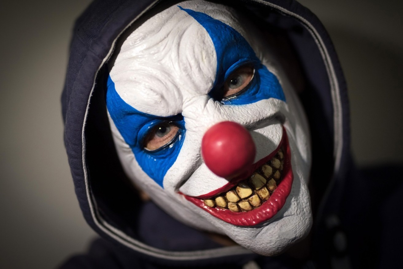 A 16-year-old girl was grabbed and scratched by a clown in Perth.
