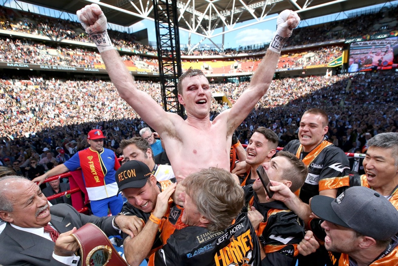 Jeff Horn celebrates his triumph over Manny Pacquiao. Now he has to defend the hard-won title.