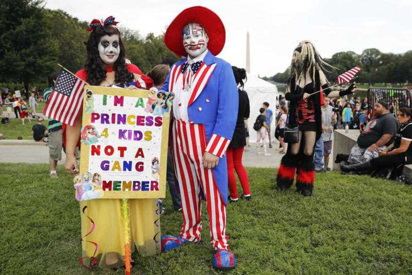 Theresa Lindsey, dressed as Snow White, and Timothy Schlarmann, as Uncle Sam, join other juggalos in Washington.