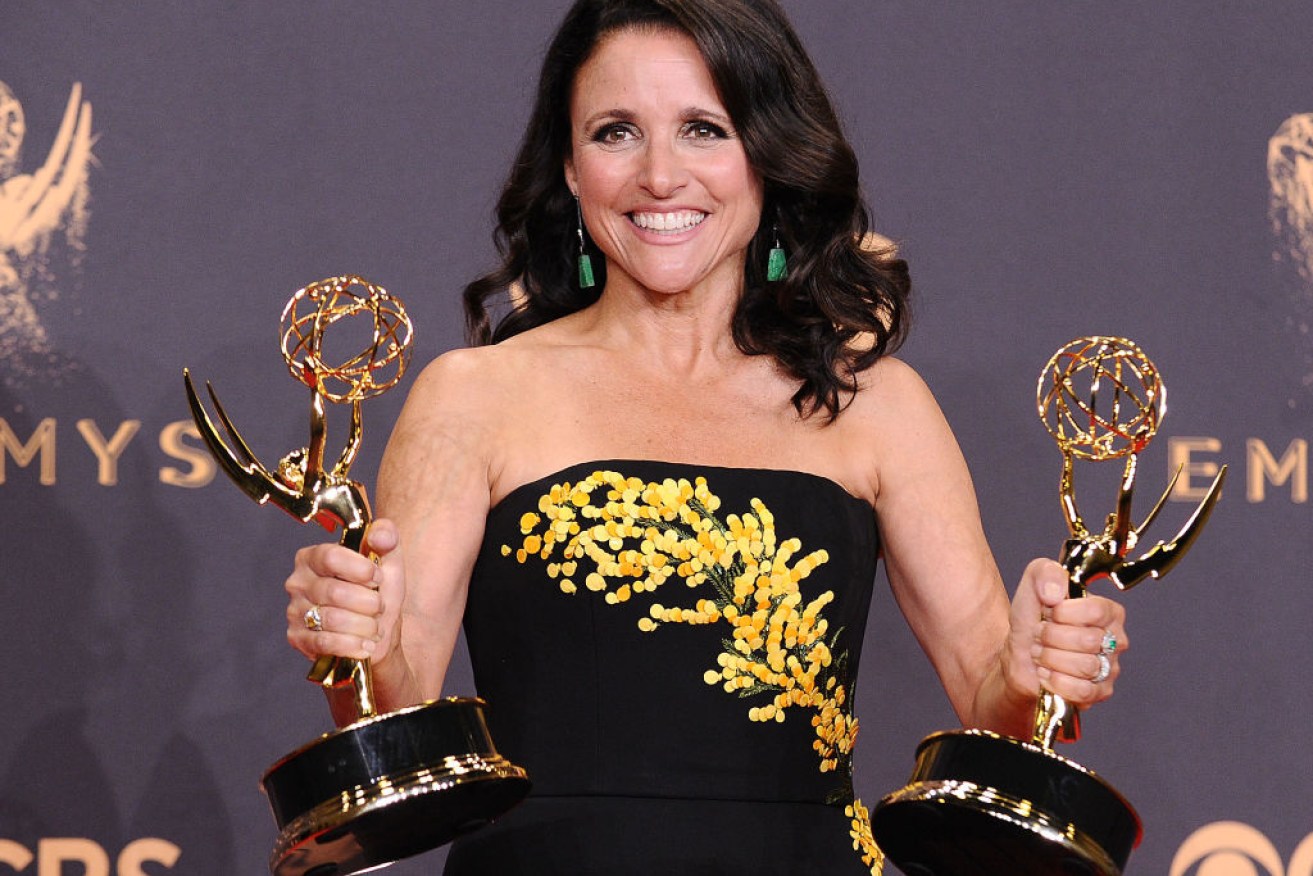 Julia Louis-Dreyfus poses with her record-breaking Emmys earlier this month. 