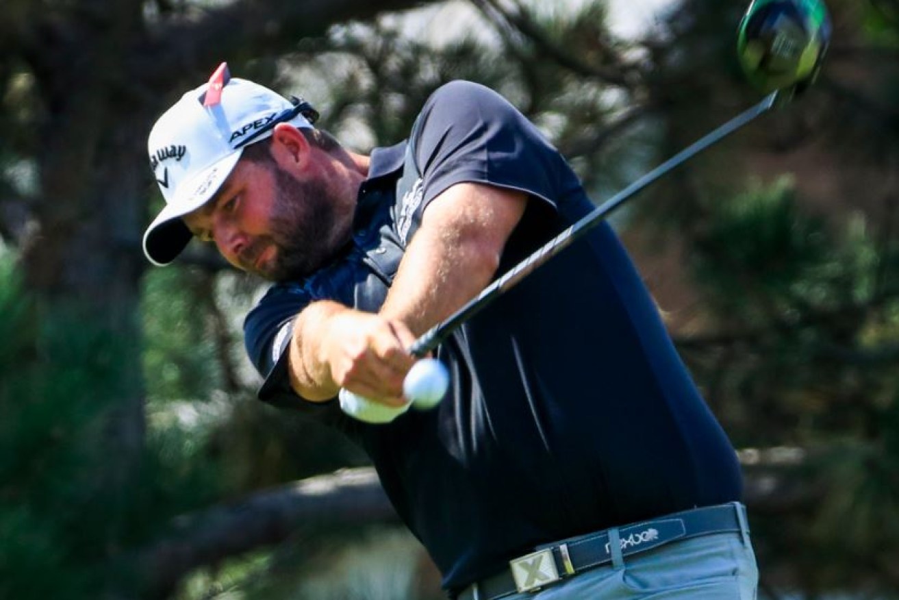 Aussie Marc Leishman puts his back into another drive at the BMW Championship in Chicago. 