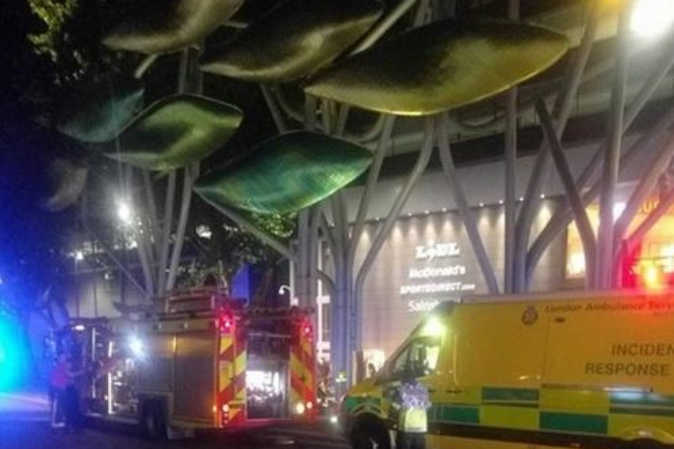 Emergency vehicles converge on the Westfield shopping centre in East London, where at least six people were scarred by a random acid attack.