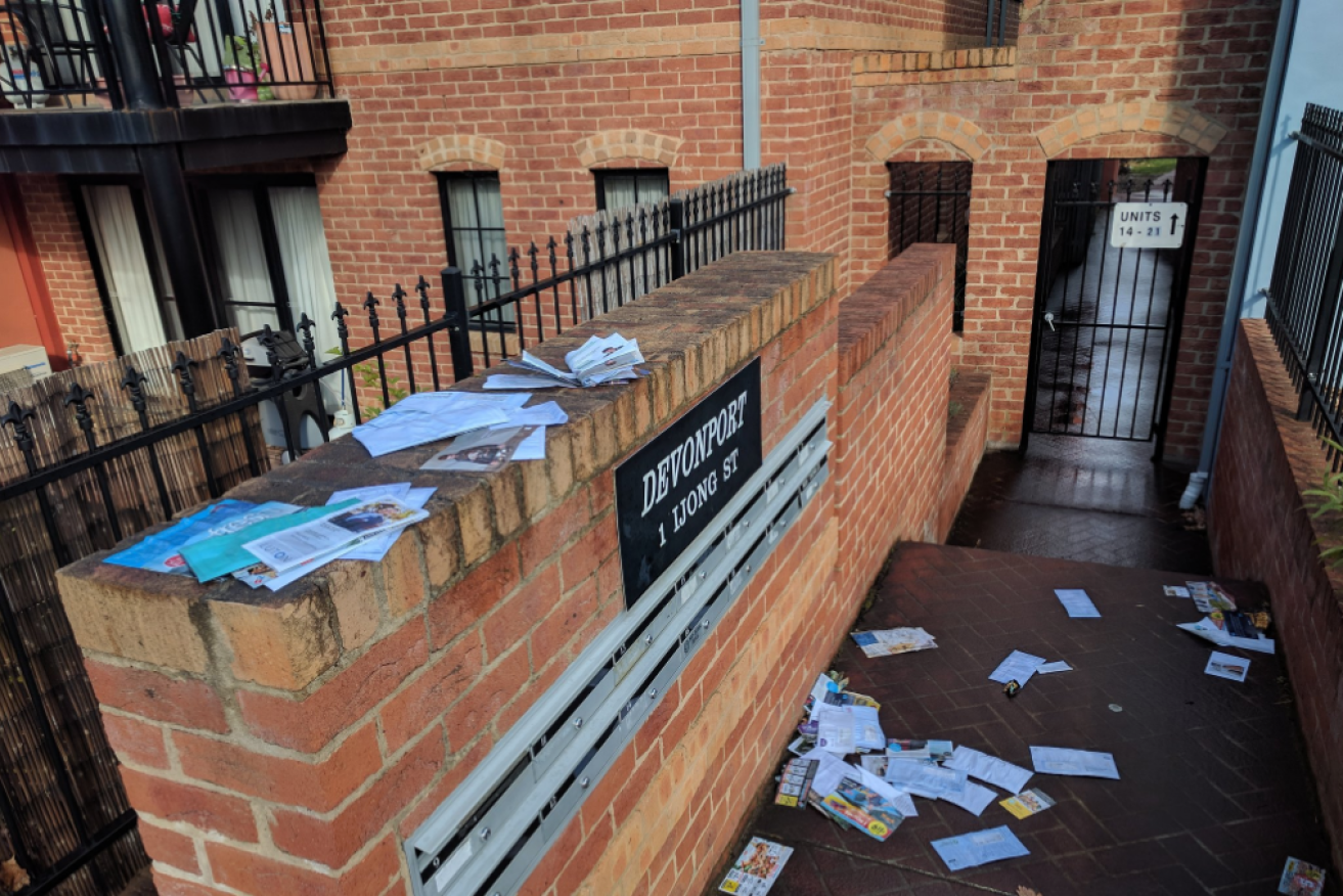 Postal surveys were reportedly left out in the rain at seven apartment blocks in Canberra.
