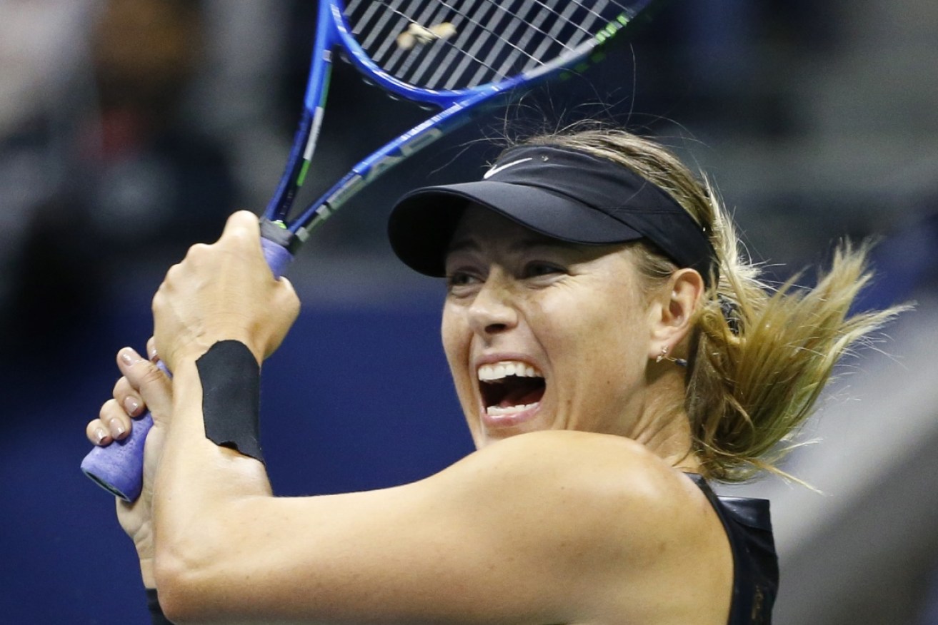 Maria Sharapova lets the racket do the talking as she breezes into the last 16 of the US Open on Friday. Photo: AAP
