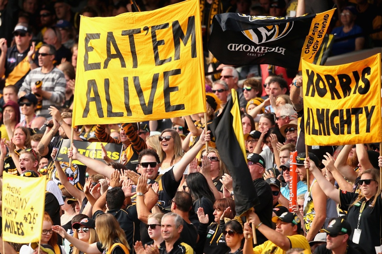 There's the pressure: Richmond fans in full flight. 