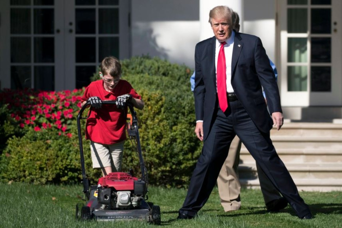 Donald Trump shadows aspiring billionaire Frank "FX" Giaccio as he mows the White House lawn.