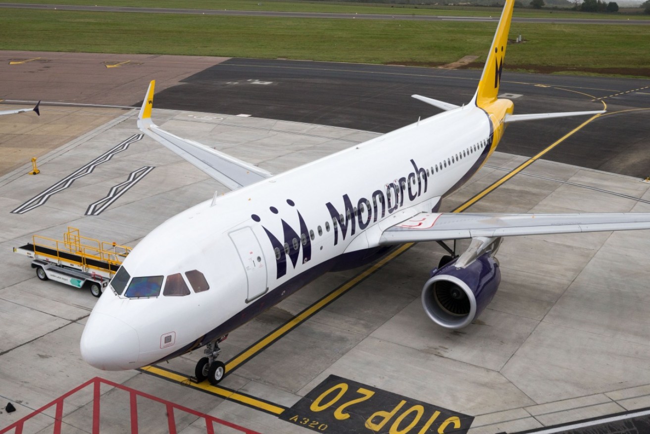 A Monarch plane at Luton Airport after the airline collapsed into administration resulting in future bookings and holidays being cancelled.