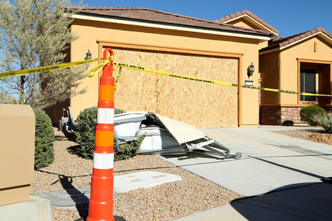 Remains of the garage door sit in the driveway in front of the house in the Sun City Mesquite community where suspected Las Vegas gunman Stephen Paddock lived.  