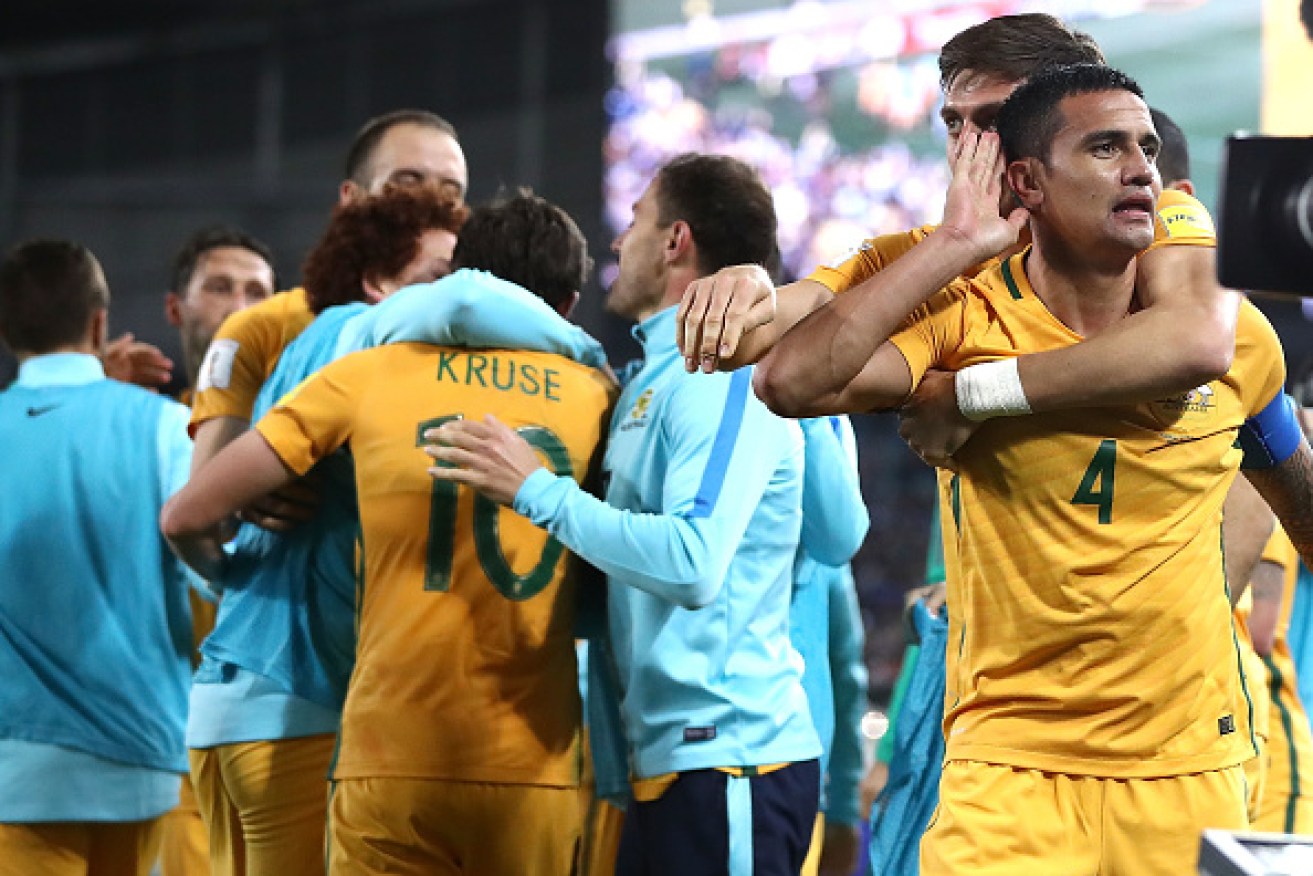 Tim Cahill celebrates after scoring the Socceroos' second goal during the World Cup Asian Playoff match against Syria.   