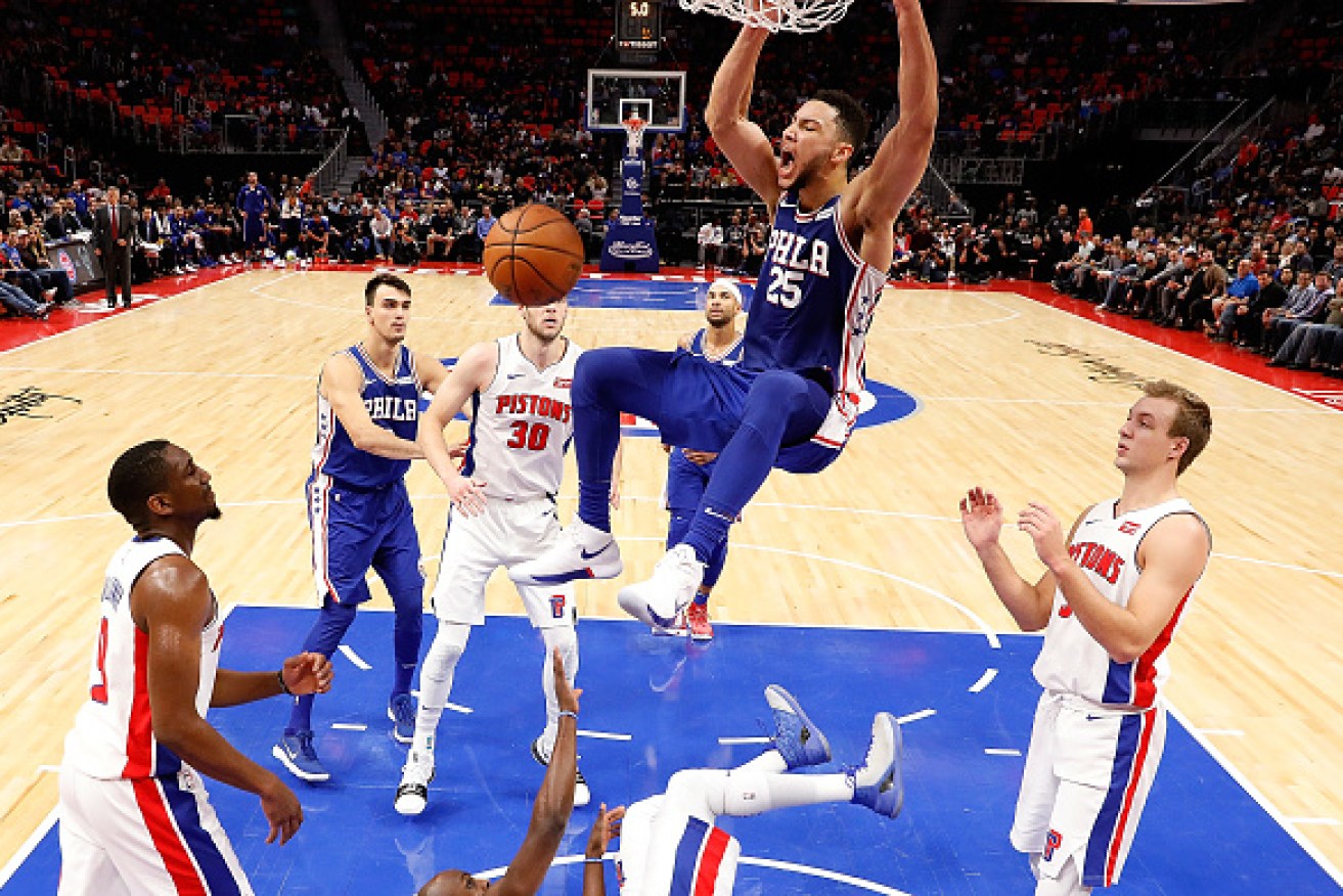 Ben Simmons of the Philadelphia 76ers scores  late in the fourth quarter of the NBA game against the Detroit Pistons.