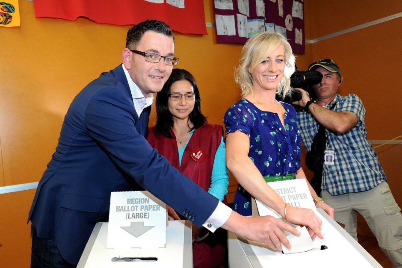 Daniel Andrews and his wife Catherine vote in the state election.