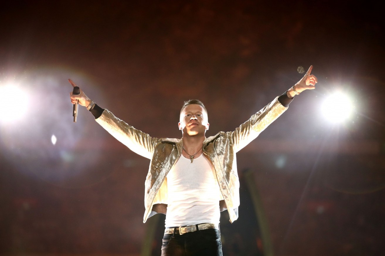 US artist Macklemore performs before the 2017 NRL grand final