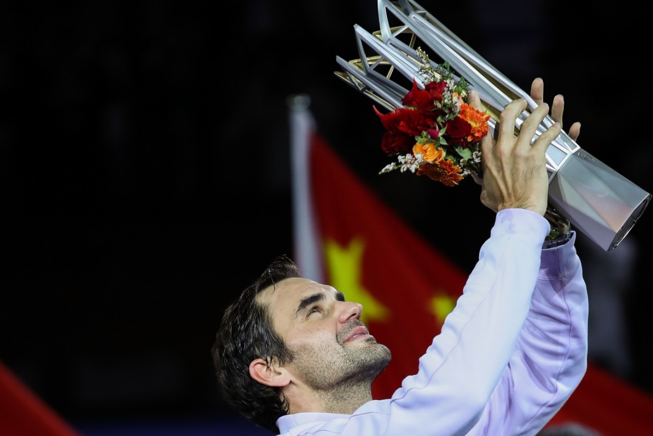 Roger Federer celebrates in Shanghai. 