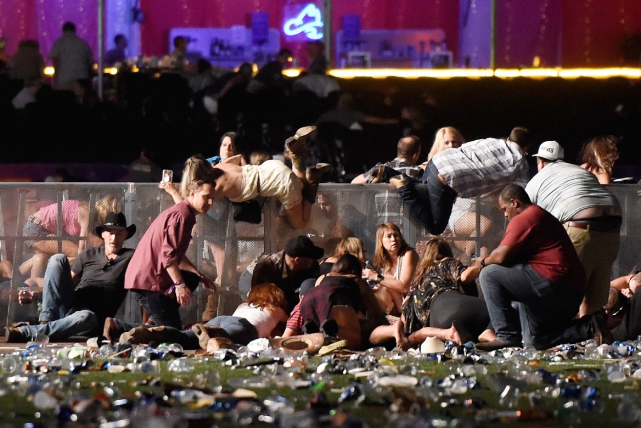 The dead and wounded blanketed the ground after the gunman opened fire from above. <i>Photo: Getty</i>