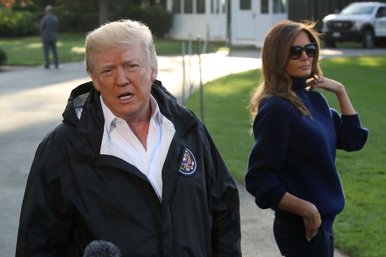 President Trump and his wife Melania before flying to Puerto Rico to see hurricane damage