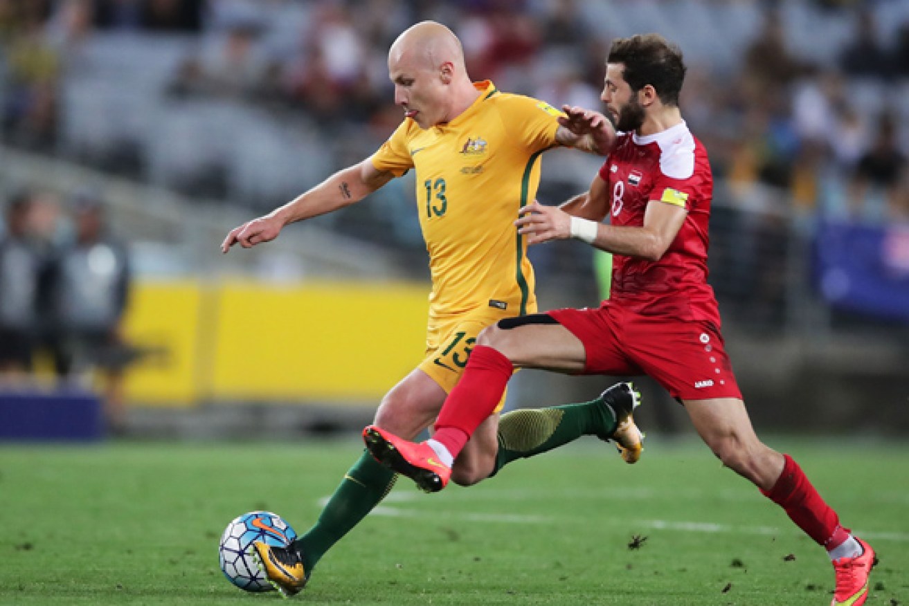 Socceroo Aaron Mooy (L) has made the Asian Cup squad. 