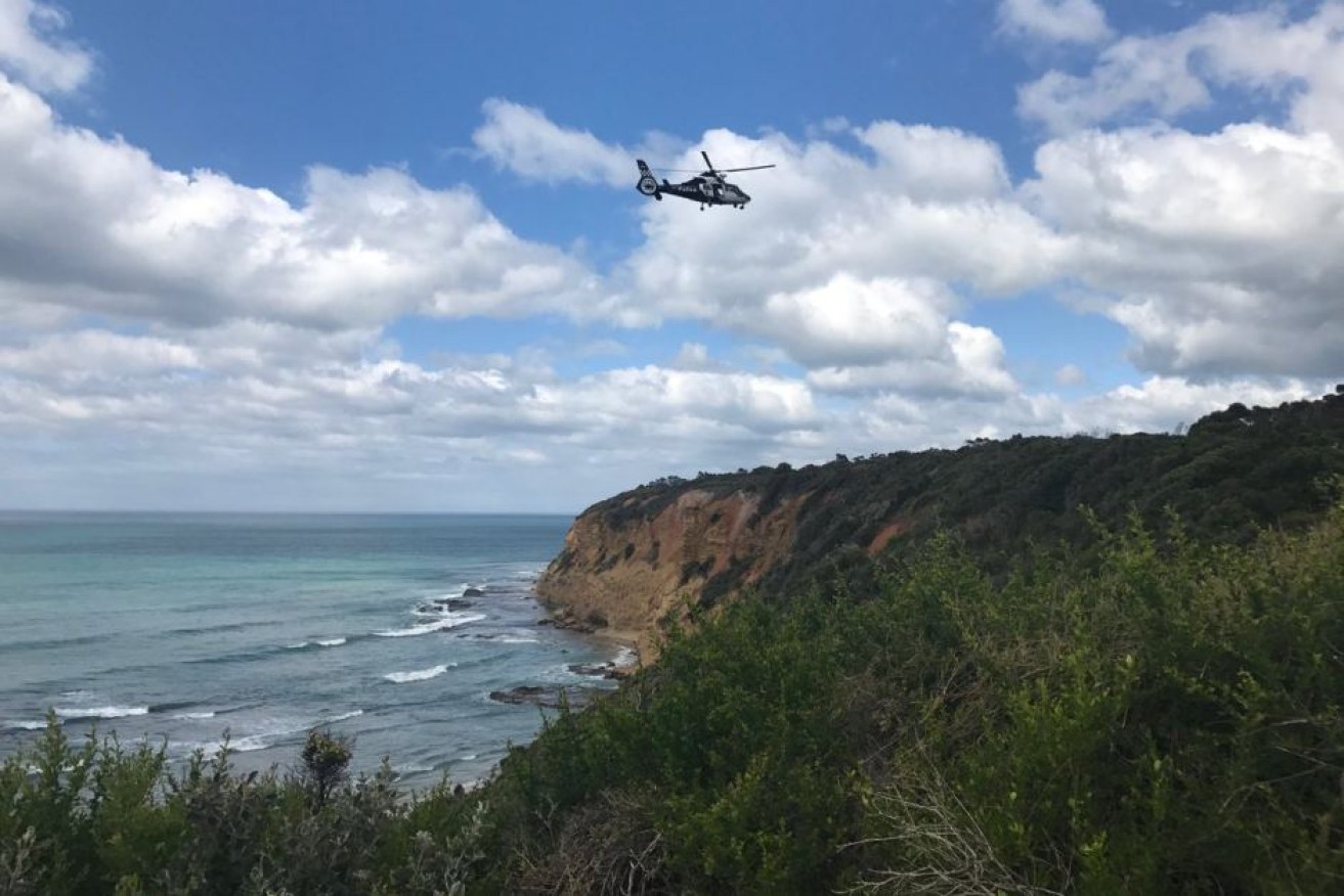 High winds on Friday prevented police divers and rope teams to search nearby cliffs and ocean.  